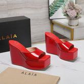 ALAIA PLATFORM WEDGE IN CHERRY RED LAMBSKIN WITH HEART EMBROIDERED